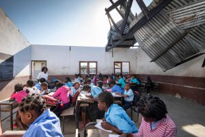 A classroom in Mozambique damaged by Cyclones Idai and Kenneth