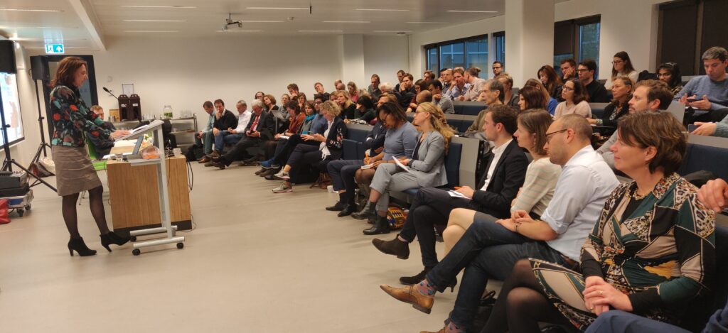 Professor in Comparative Politics and NIMD Supervisory Council member Ingrid Van Biezen addressing the event at Leiden University Campus The Hague.