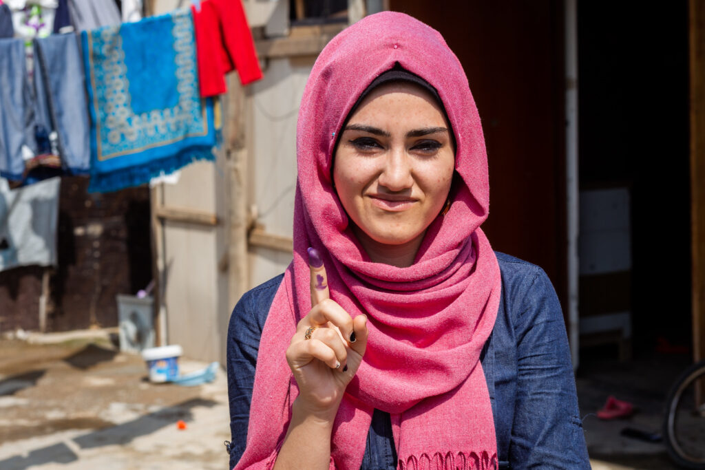 Portrait of Zainab, an 18 year old girl displaced from Anbar province. She now lives in Harsham camp for Internally Displaced Persons in Erbil, and went to vote for the first time.